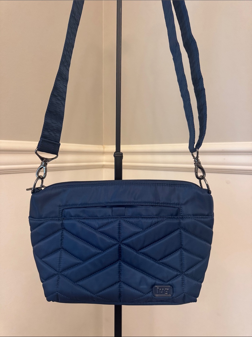 Lug Flare Quilted Crossbody Bag in Navy Blue